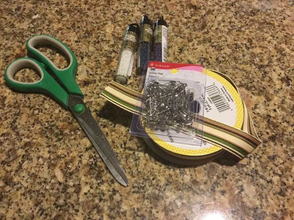 For supplies you will need scissors, ribbon, safety pins and beads.