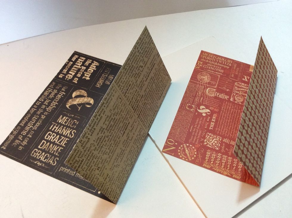 For the 2nd pane, cut 2 pieces of paper and fold to create pockets.