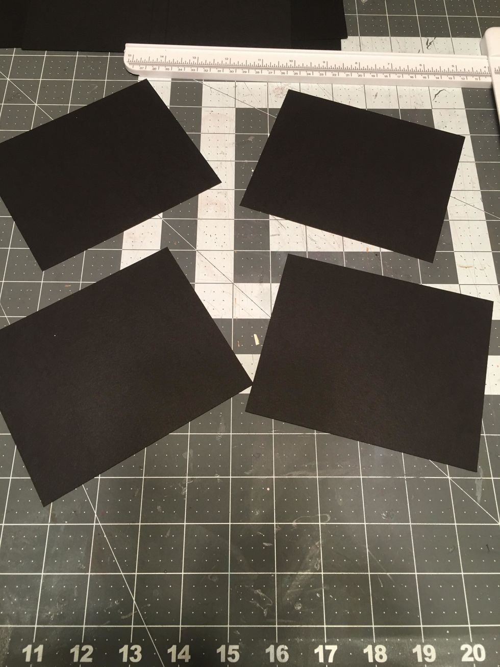 For the album covers, cut 4 each 4 1/2" x 5 1/2" out of black cardstock.