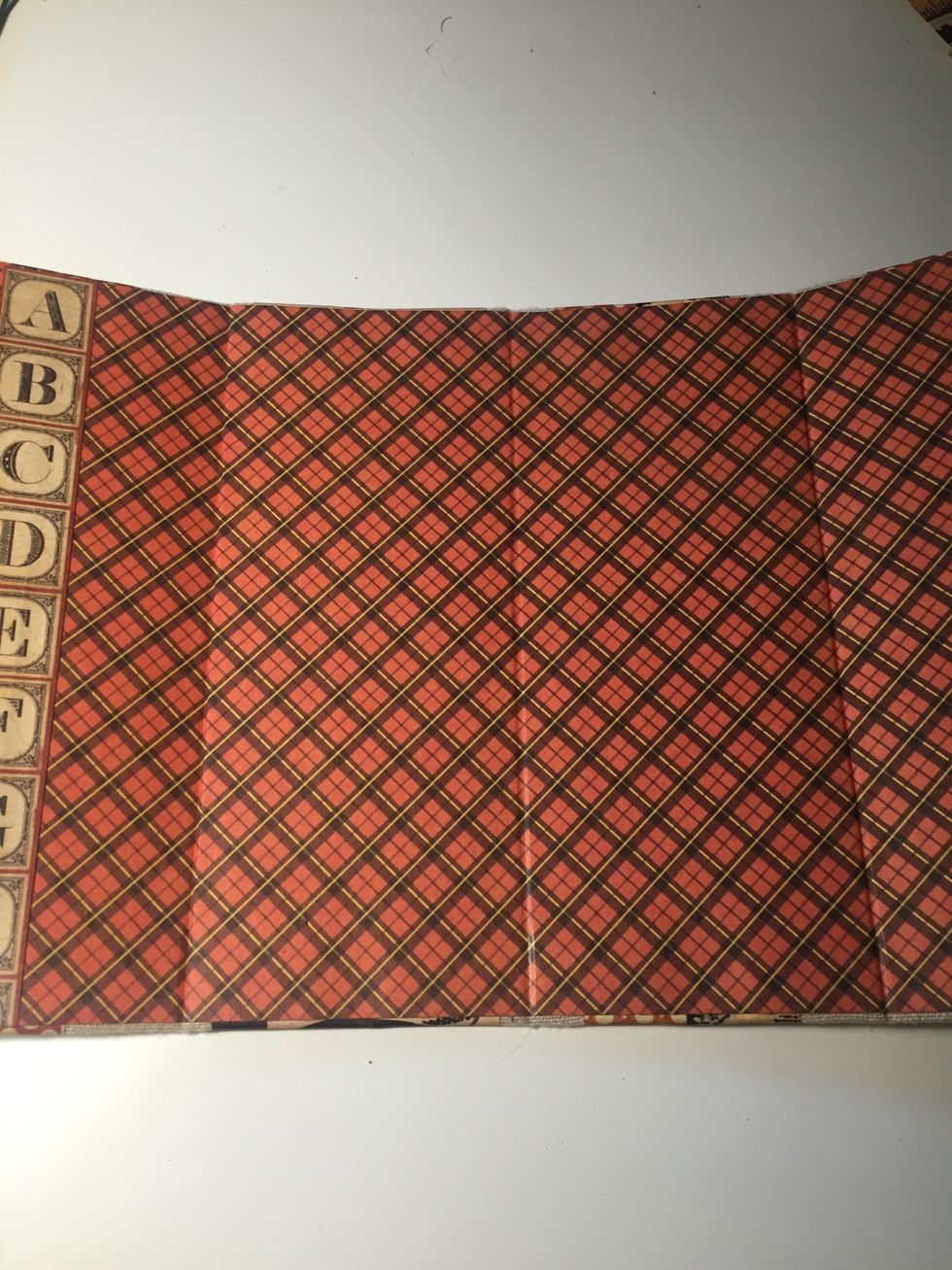 For the back side, cut a piece of ABC paper and and adhere to the back case