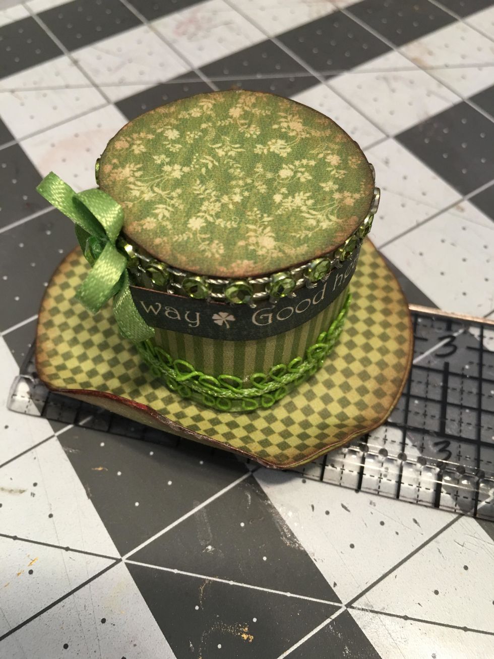 For the brim, cut one circle out of patterned paper about 2" in diameter.