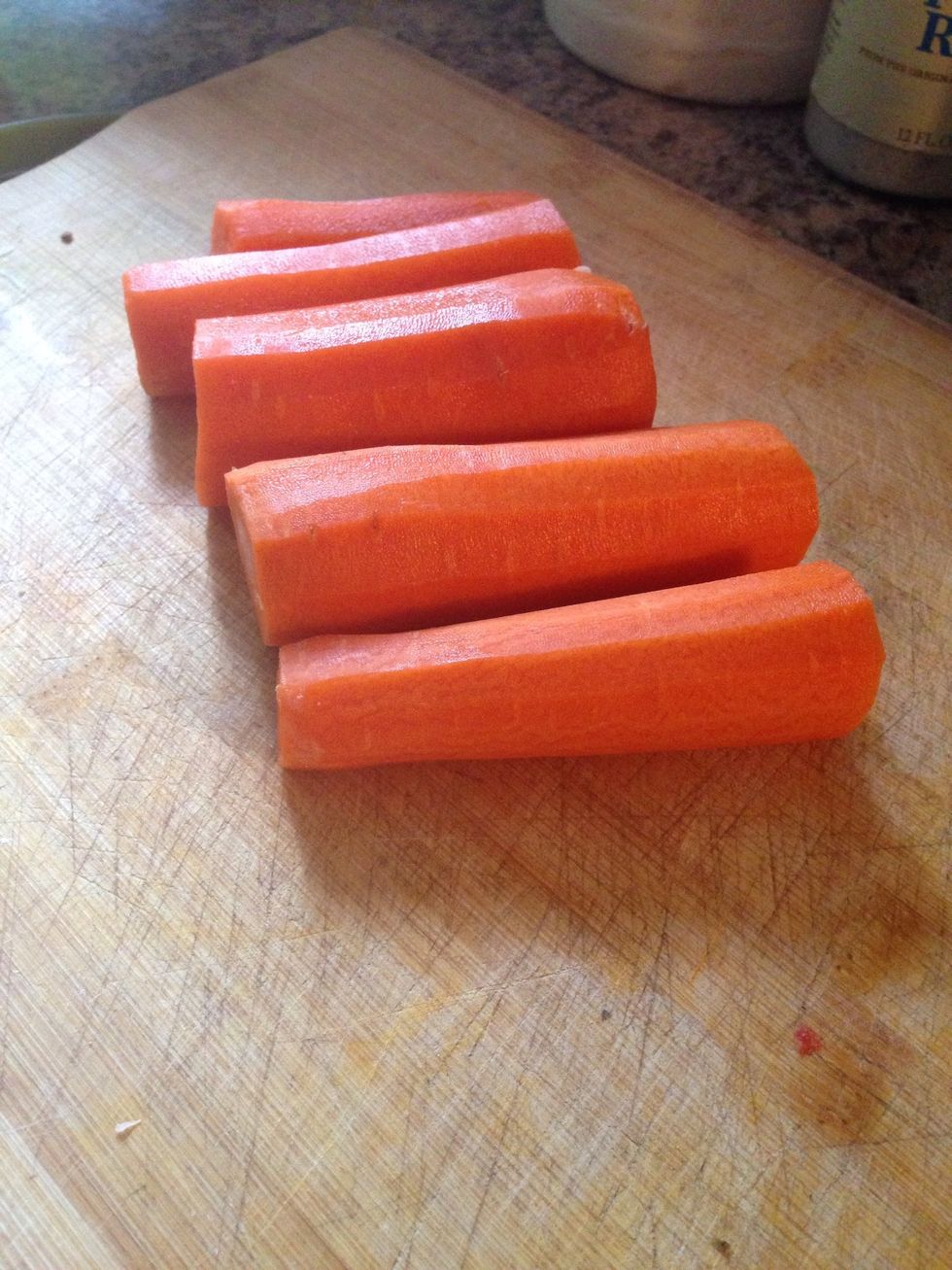 For the carrots it's tricky to try to maneuver it on the grater if the carrot is left whole. It's best to cut the carrots in half.