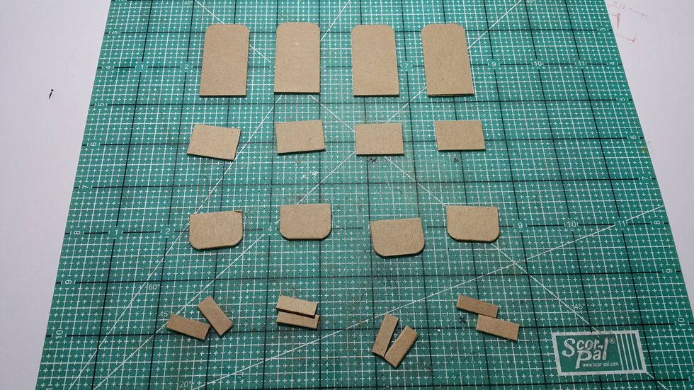 For the chairs, ready chipboard for the back, the seat and the feet, the tiny ones are for hold them in place.