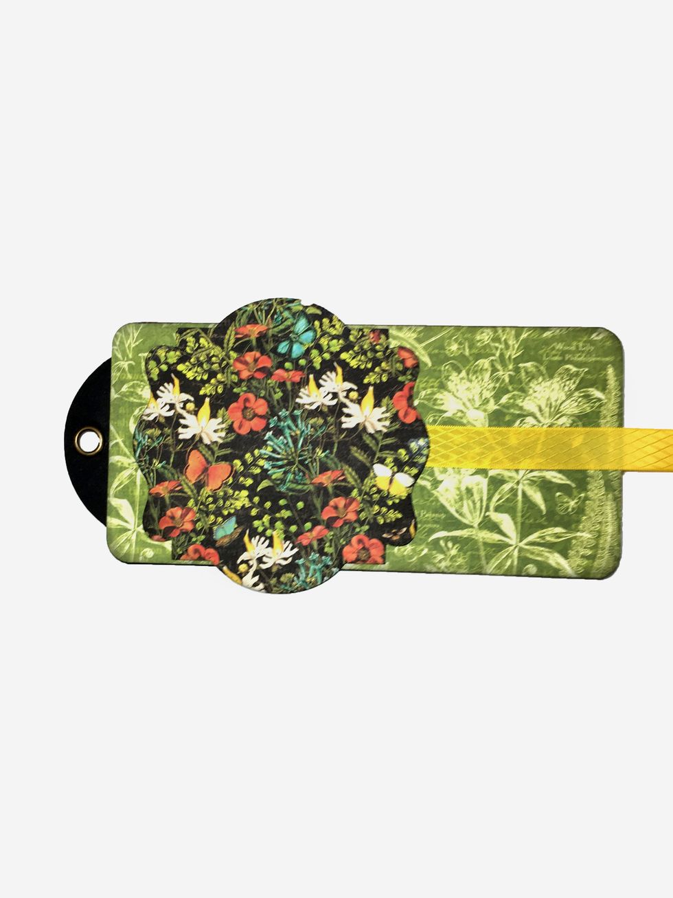 For the cover:  Cut 2 - 18" pieces of ribbon.  Choose a tag for the cover & glue one piece of ribbon in the center.  Diecut a shape slightly larger than the tag and adhere as show in the photo.  con't