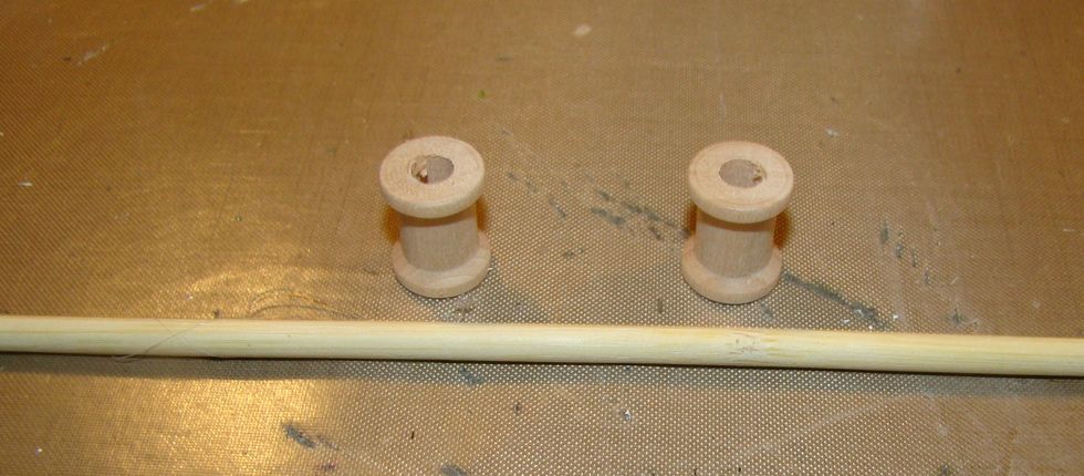 For the curtain rod I used a wooden skewer and two mini spools.