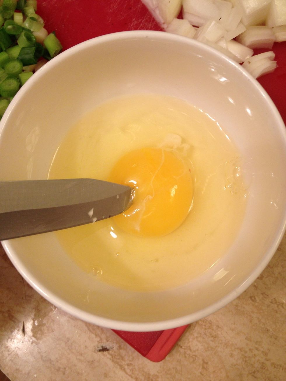 For the egg, I like to pop the yolk and loosely scramble it once.