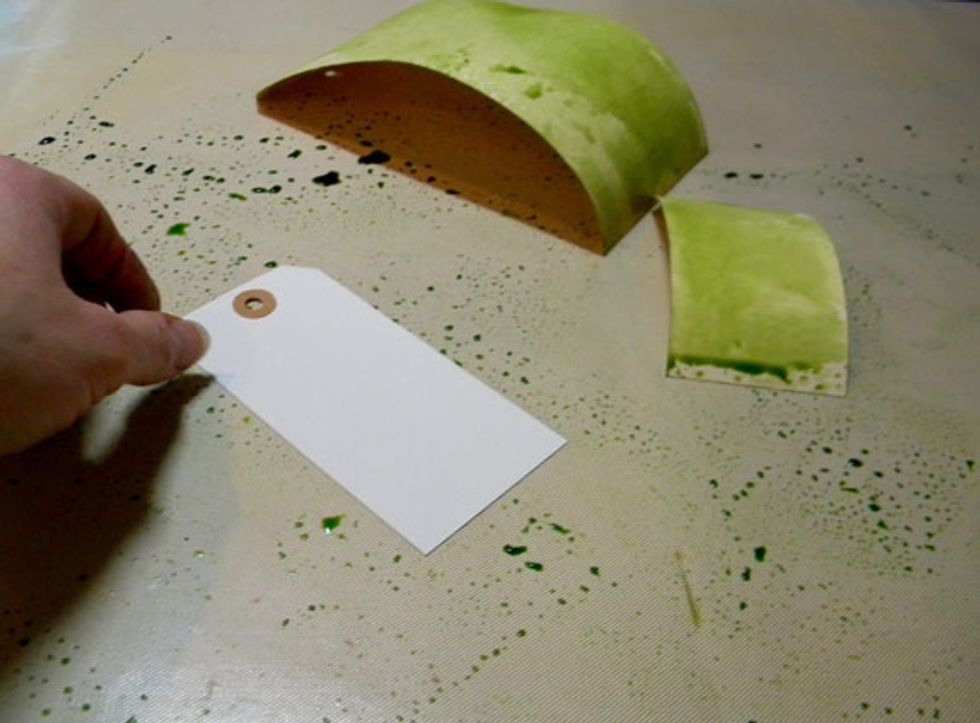 For the extra spray on the craft mat, I like to grab some tags and swipe them through to soak up the color.