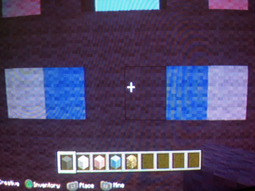For the eyes put 1 blue block in and 1 white block out .