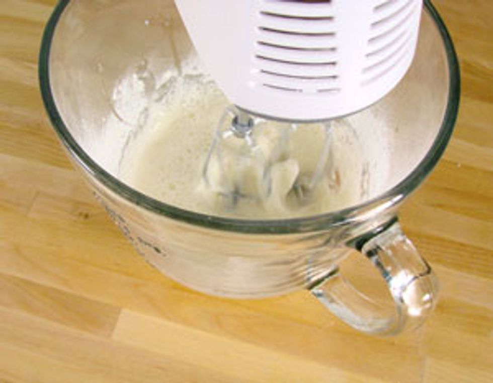 For the frosting, blend the Meringue powder and 1/2 cup water together and mix until you have a smooth lump free consistency.
