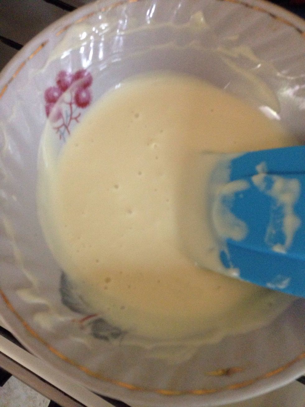 For the frosting melt 100g of white chocolate over a ban marine