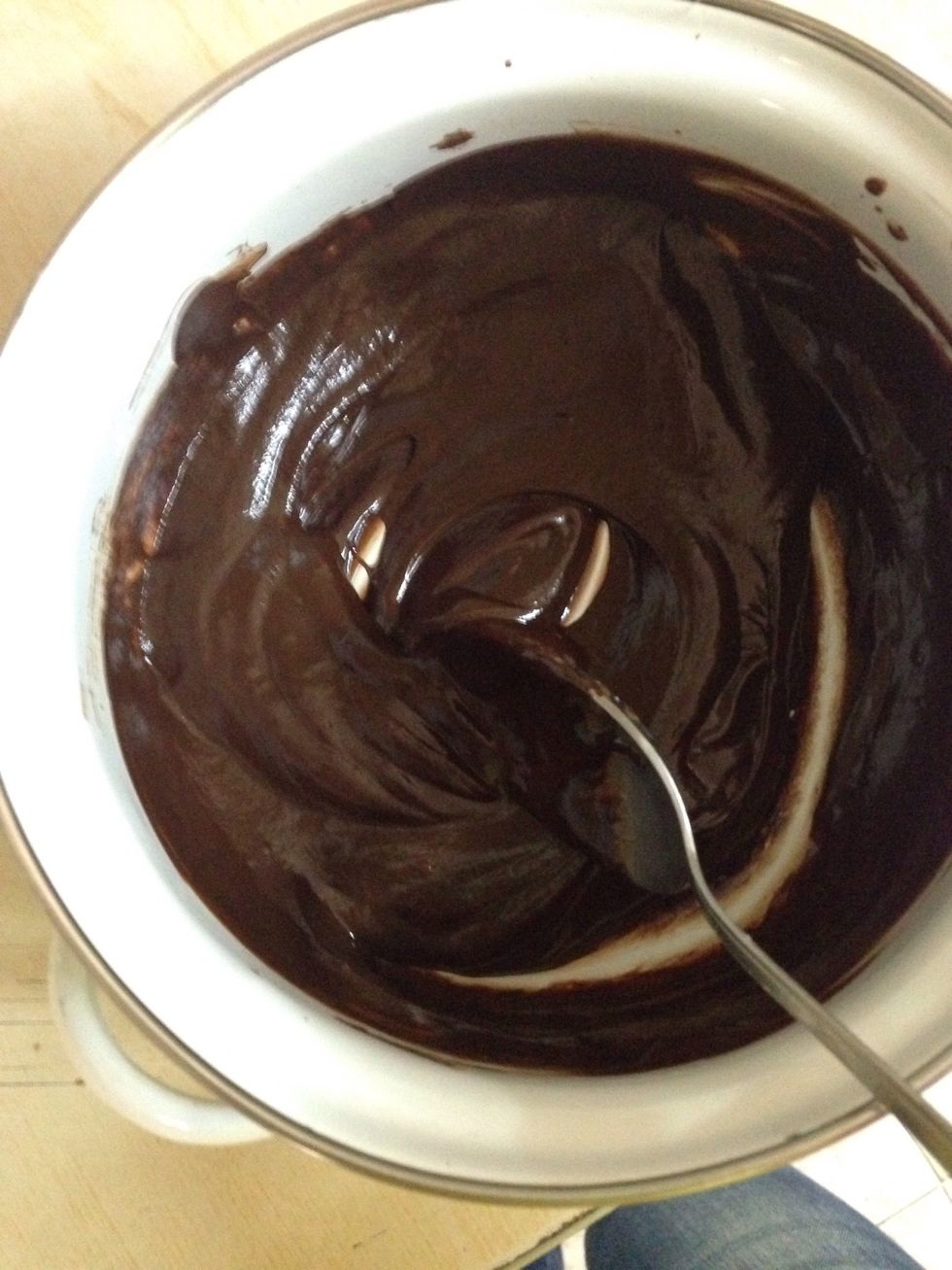 For the glaze melt the chocolate and milk over a very low heat. Then take of the heat, add the butter, sugar, and cocoa powder.