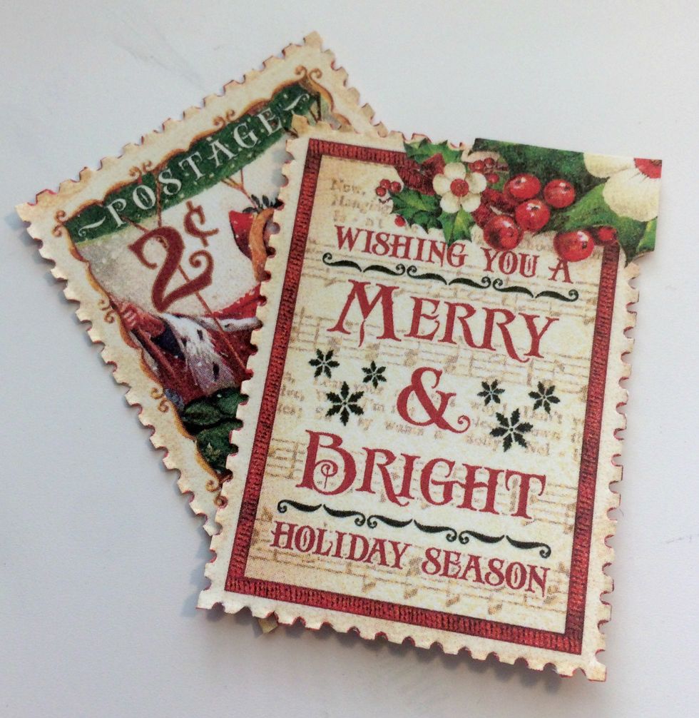 For the inside of the card, fussy cut two postage stamps out from the St. Nicholas paper.