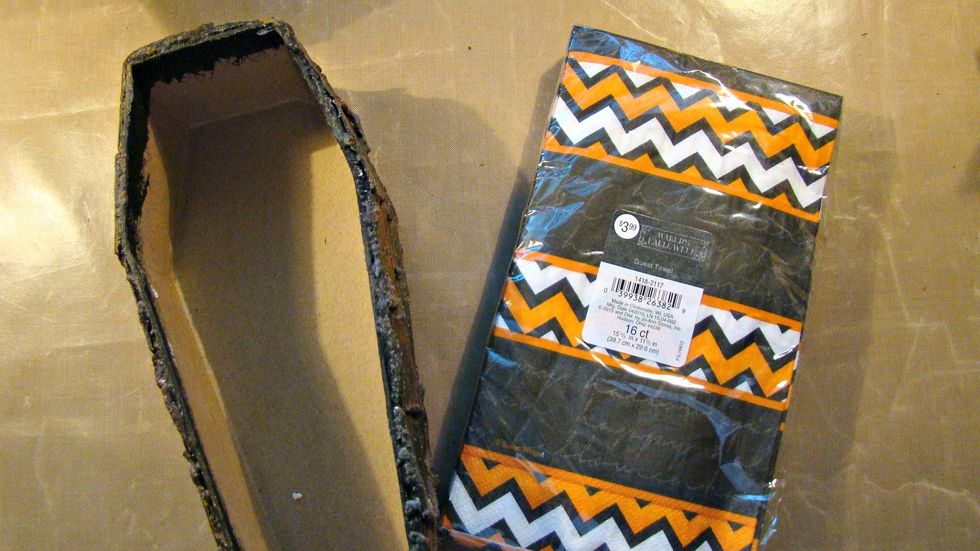 For the inside of the coffin,  decoupaged a Halloween napking using Mod Podge.