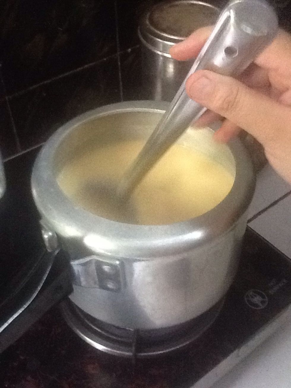 For the kadhi mix all the kadhi ingredients and add 1/2 cup of water to it and bring it to boil. Remember to keep stirring for 5 minutes. Otherwise the curd will get separated.