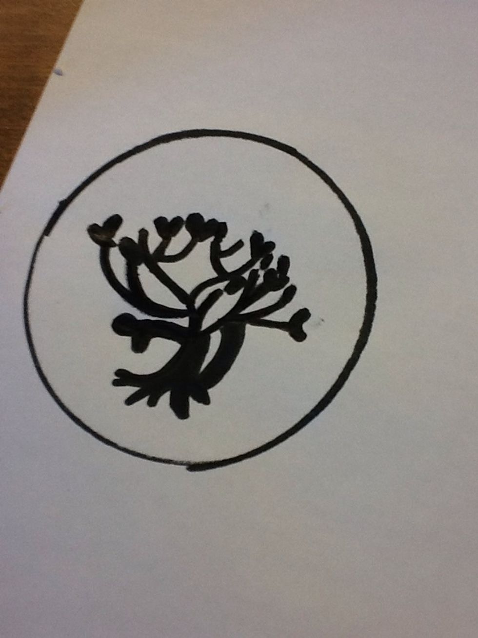 For the last step all you have to do is draw in the rest of the tree limbs, then add some buds at the tips of each branch. Then add your circle.