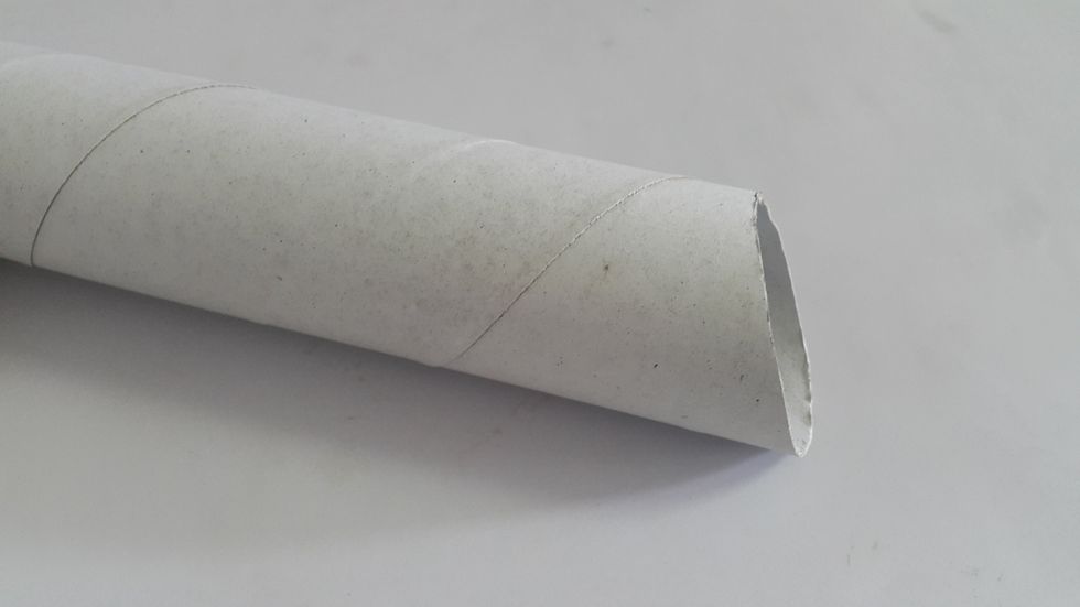 For the middle cylinder, cut a kitchen tissue roll top to an angle, you can use a rubber band to help