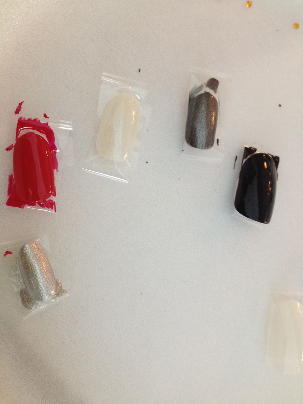 For the middle finger I used a sparkly white. And for the pinky finger I used a sparkly silver.