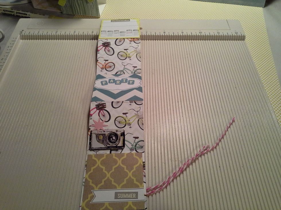 For the mini album that goes inside you will need a 12 x 2 1/4 inch pc. of pattern paper. Score every 2 1/4 inches on the 12" side until the 11 1/4 inch then score 1/4 inch. This will form the flap.