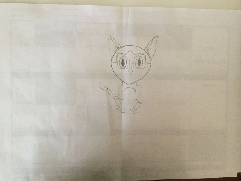 For the mouth, draw a light line half a centimetre down the two curved lines. At the bottom of the line, draw a little smile.