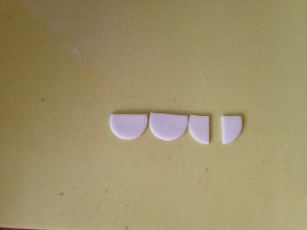 For the next row, cut out 3 circles again, cut off 3/4 way, but this time you will have to cut 1 circle into half