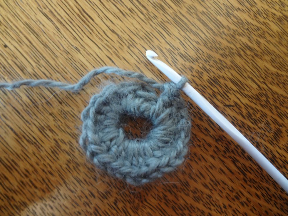 For the next step, repeat steps 11-20ish, except put the string through those little v-shaped stitches. Continue this around and around your circle until you have a circle that is much larger.