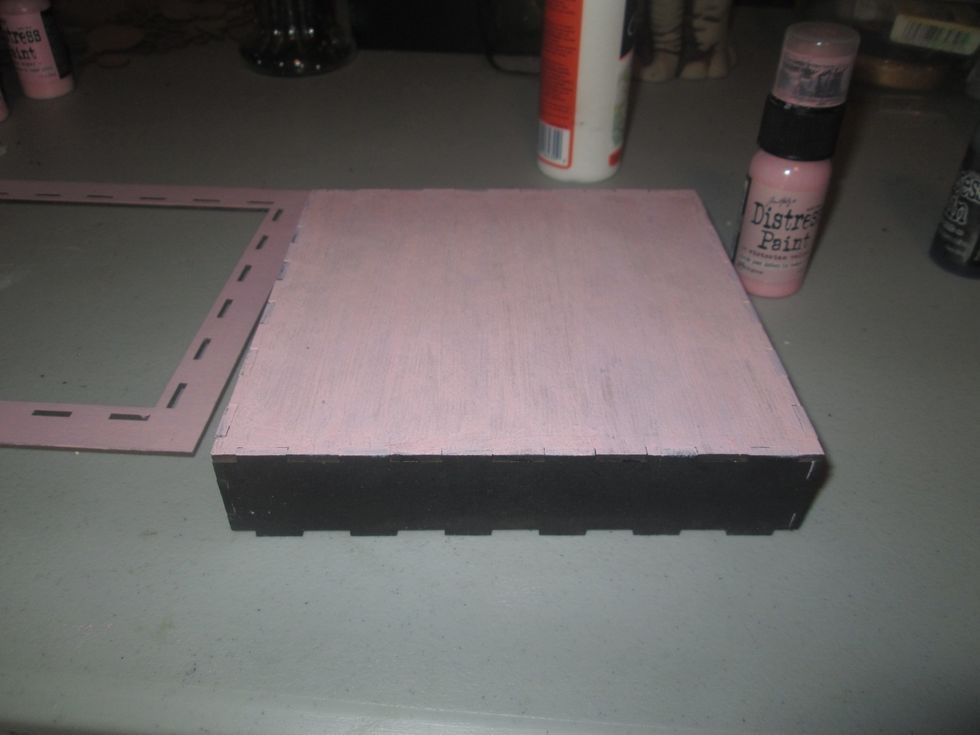 For the outer sides of the box I chose to use black paint to coincide with my theme.