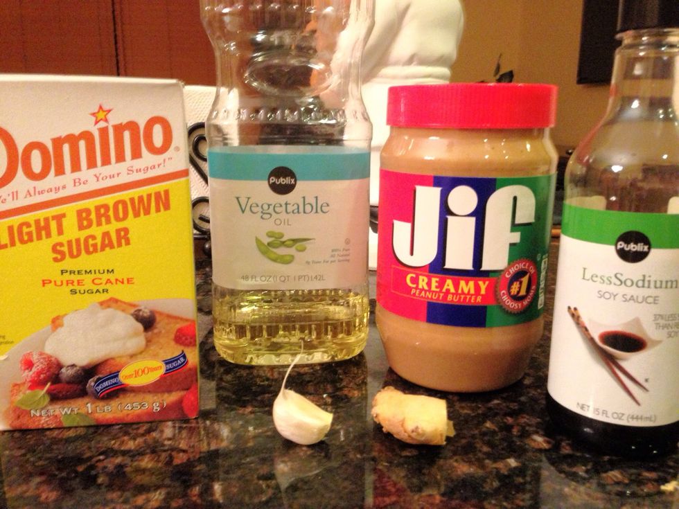 For the peanut sauce you will need garlic, ginger, peanut butter, oil, brown sugar, and soy sauce.