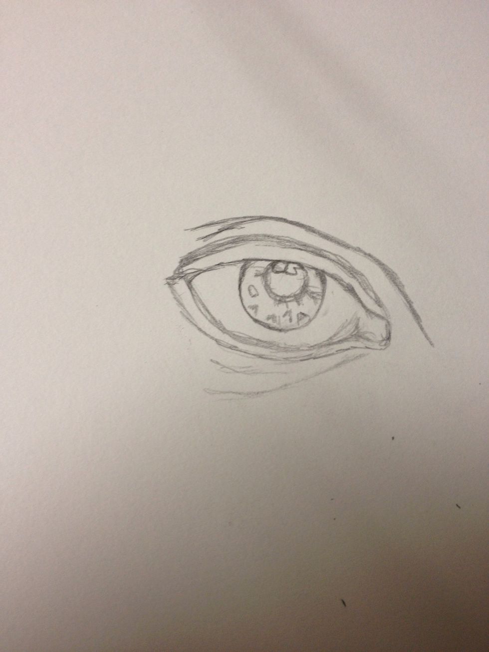 For the pupil, I planned out where the light "pockets" will be at. The little checks and dashes within the iris is to give more dimension when we shade.