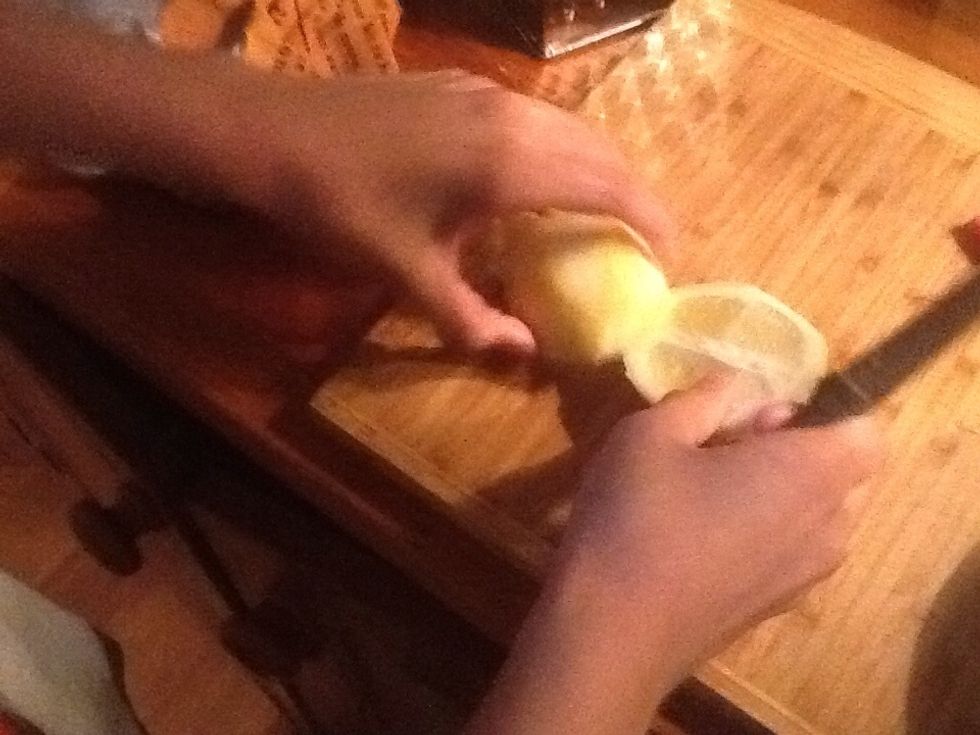 For the salad, squeeze the juice of half a lemon into a bowl as well as some olive oil.