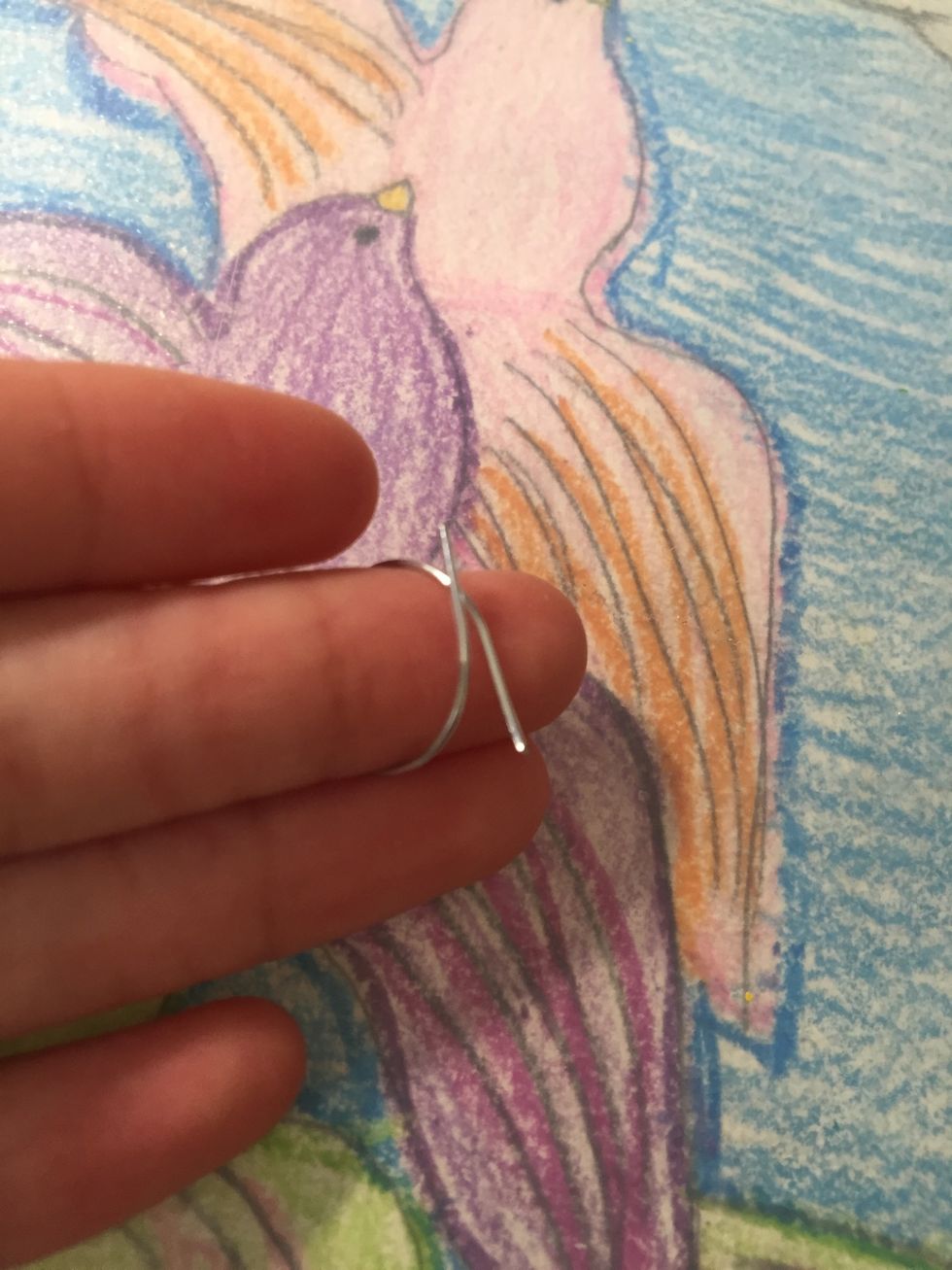 For the second ring cut of 4 to 5 inches of wire and wrap it around your marker then cut of the extra wire