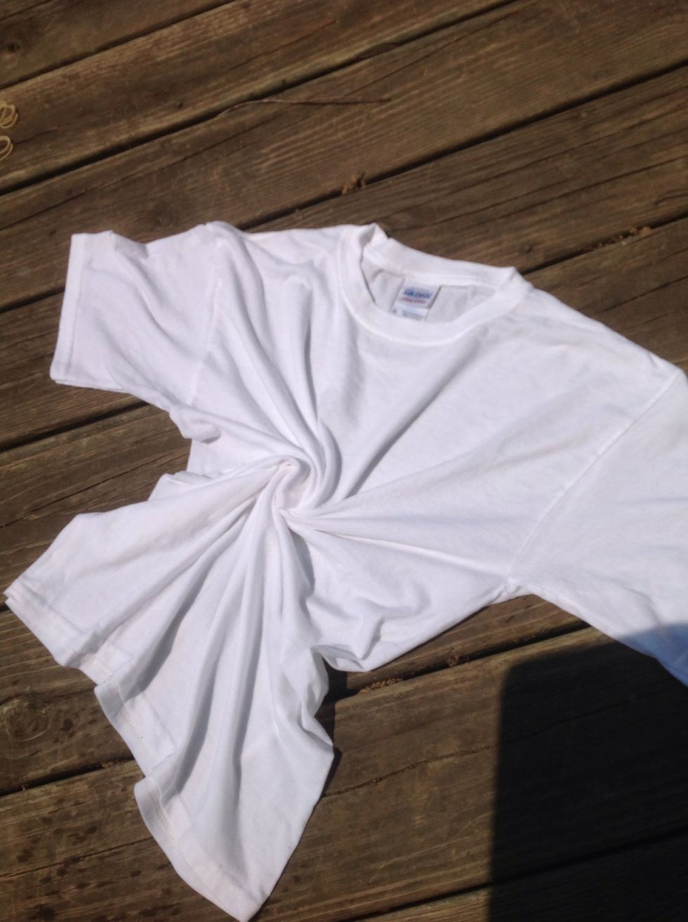 For the spiral pattern you are going to twist the shirt around, starting at the center until you get to the end and just put rubber bands around.