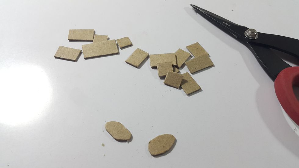 For the stone on the garden floor, I hand cut chipboard into tiny piece in random shape.