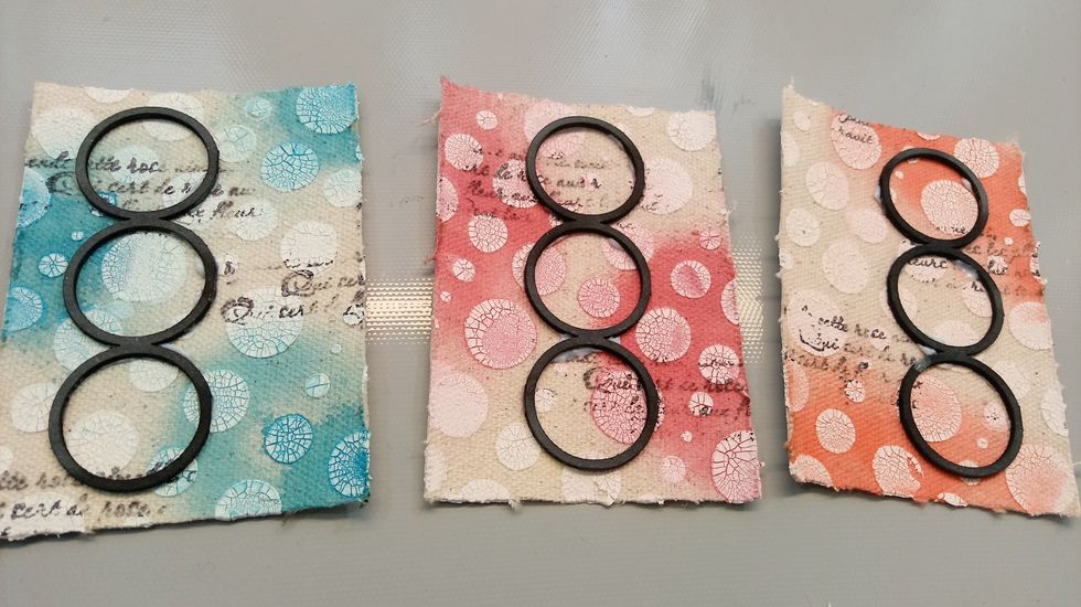 For the third one, I'm choosing Patience Colorations Spray. It looks great with the black accent, so I added a some cursive writing with a stamp and black ink.