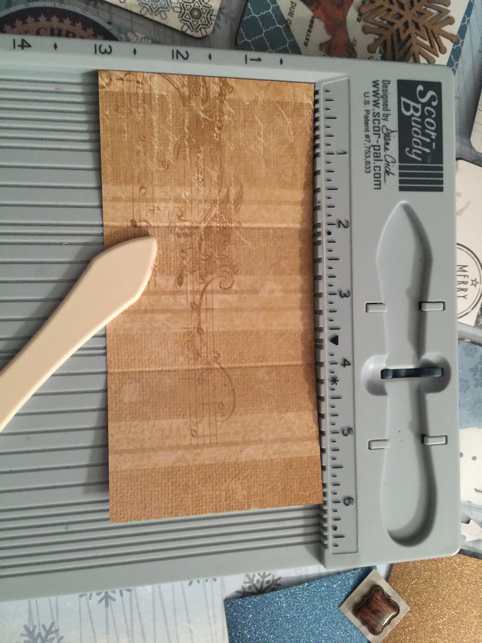 For the tiny letter insert, score one of the 6 x 3" papers at 2" and 4". You will find this size in the Ephemera pack.