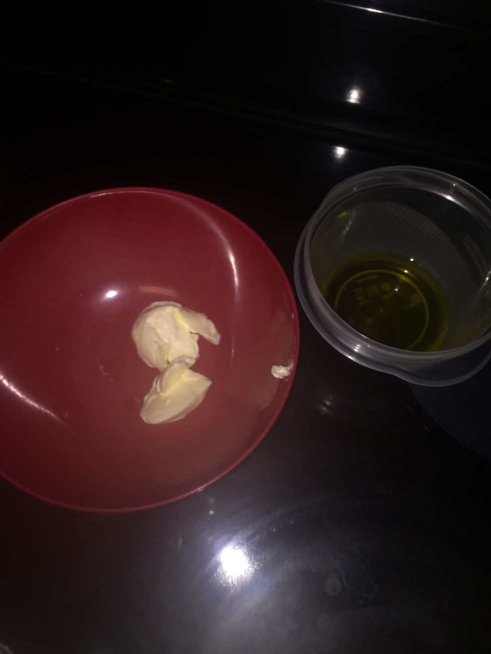 For the tomato sauce melt the oil and the butter in a sauce pan