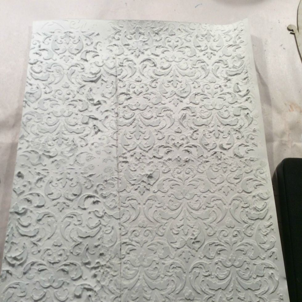 For the wings I took cardstock and used a stencil with Modeling Paste and covered the entire sheet. Allow to dry completely.