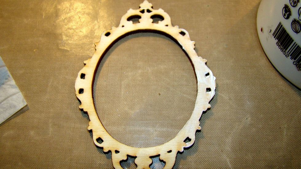 For the wooden frame I added a light coat of gesso or you can use white acrylic paint.