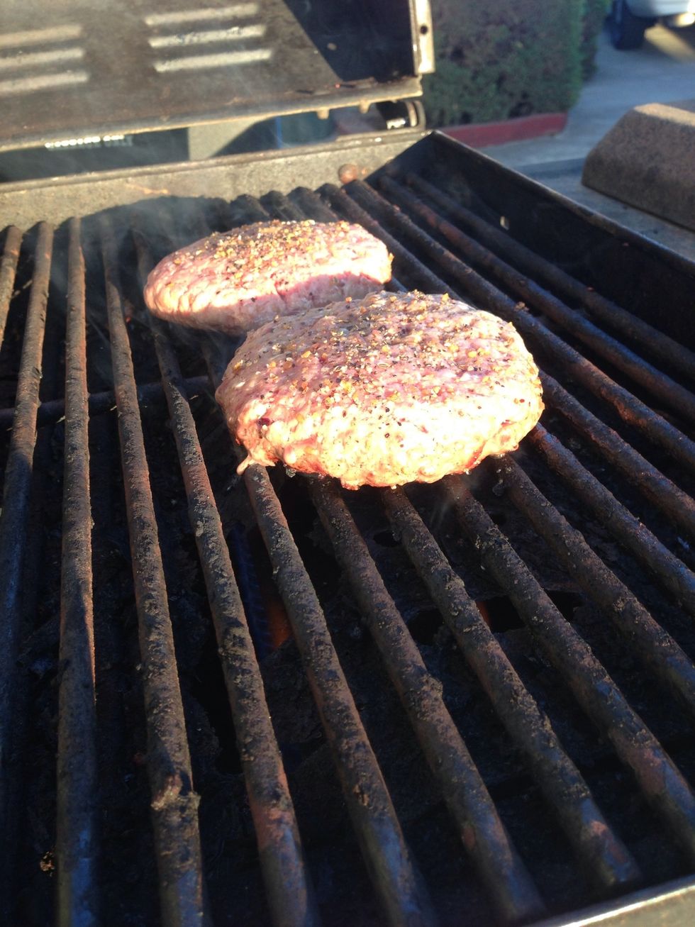 For these burgers, I would recommend cooking them to around med rare or medium so the cheese cooks. After about 4 mins, flip the patty. You can tell its ready because the sides are turning gray/brown.
