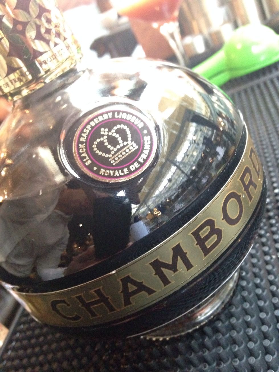 For this ale based cocktail we'll start by adding 25ml (1oz) of Chambord to a cocktail shaker.
