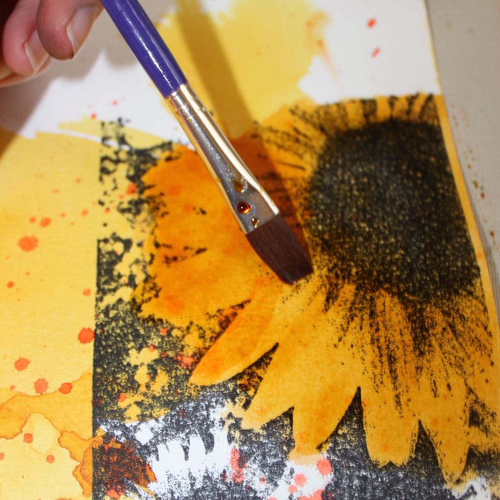 For this part I used a Technique Junkies sunflower stamp. I stamped it to a 5x6 piece of the same watercolor paper. The proceeded to use the Colorations with a brush to color in the flowers.