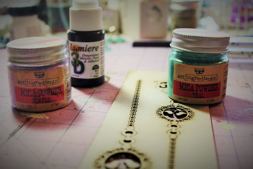 For this piece I used mica powders in purple and teal as well as embossing powder in bronze. This technique is actually based on a technique that I learned from Rae, Design Team member for Swirlydoos.