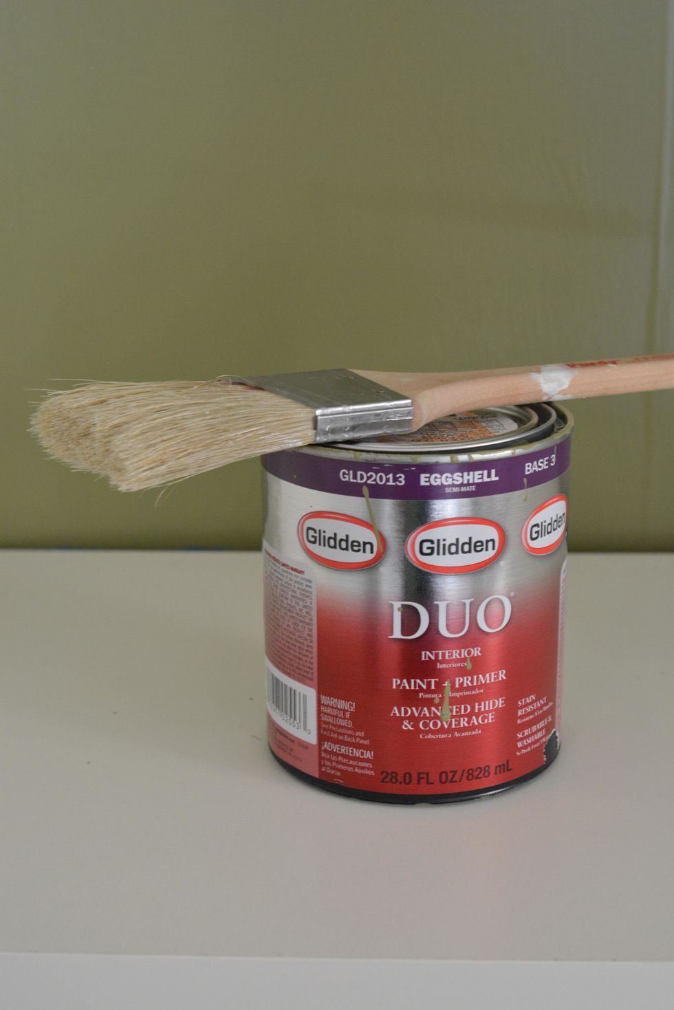 For this project, a Primer + Paint formula is recommended such as Glidden's Interior DUO in Eggshell sheen. The paint color used for this project was Glidden's Alligator Pear.