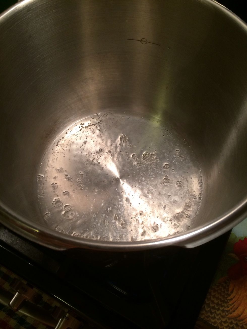 For this step I'm using my dear friend,the pressure cooker. He makes things so easy for me. In a pressure cooker i added 2 1/2 cups of water