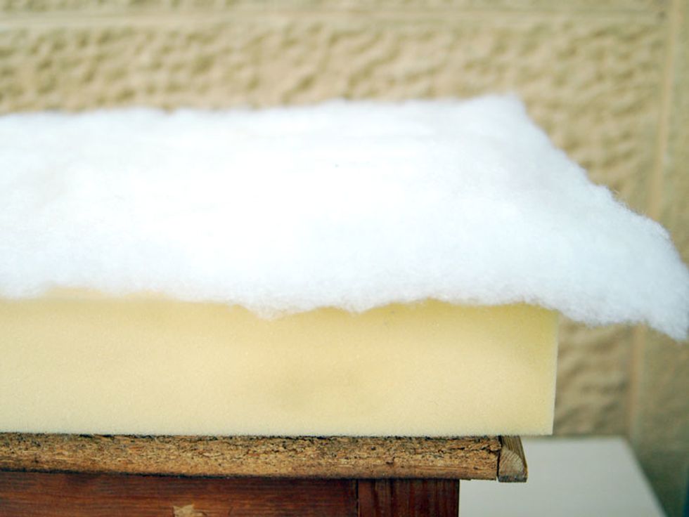 For upholstery, spray the adhesive on the seat of stool (wear a mask and work in a ventilated area). Place the foam cut by the seat size and tight it well. Cover the foam with a layer of acrylic foam.