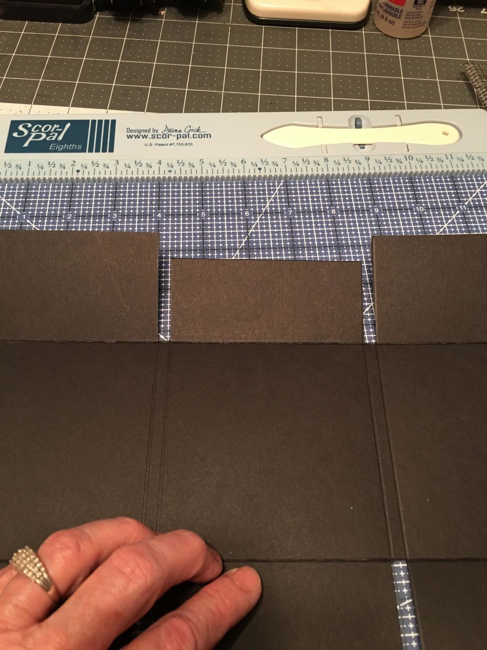 For variety on your top flaps, trim the center flap by cutting off 1/2" from the top edge of the flap.