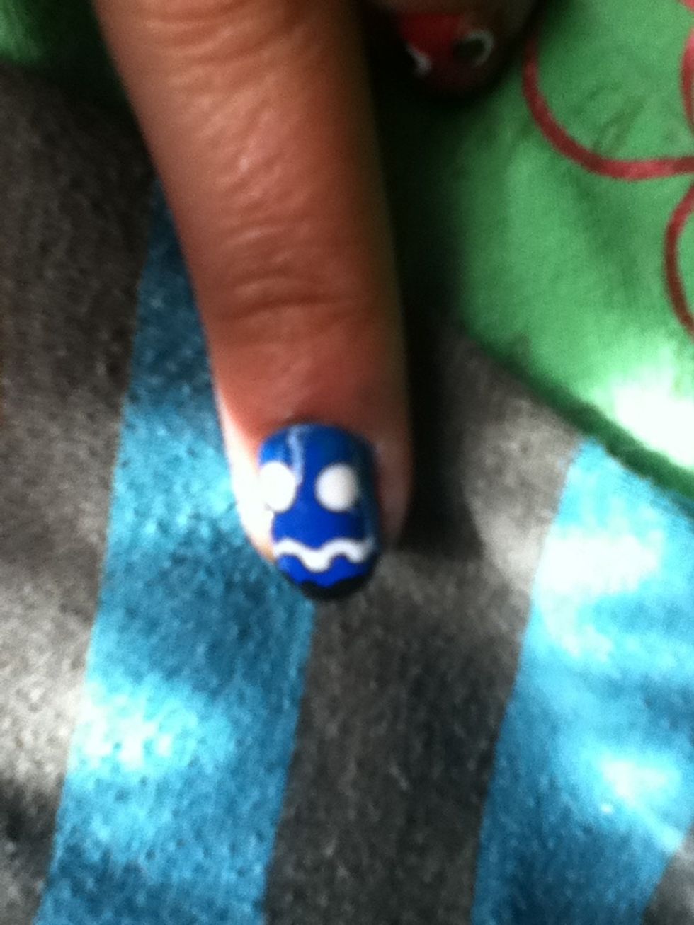 For your middle finger we going to create the blue one add two white circles and with a white striper make a twisted line for the mouth