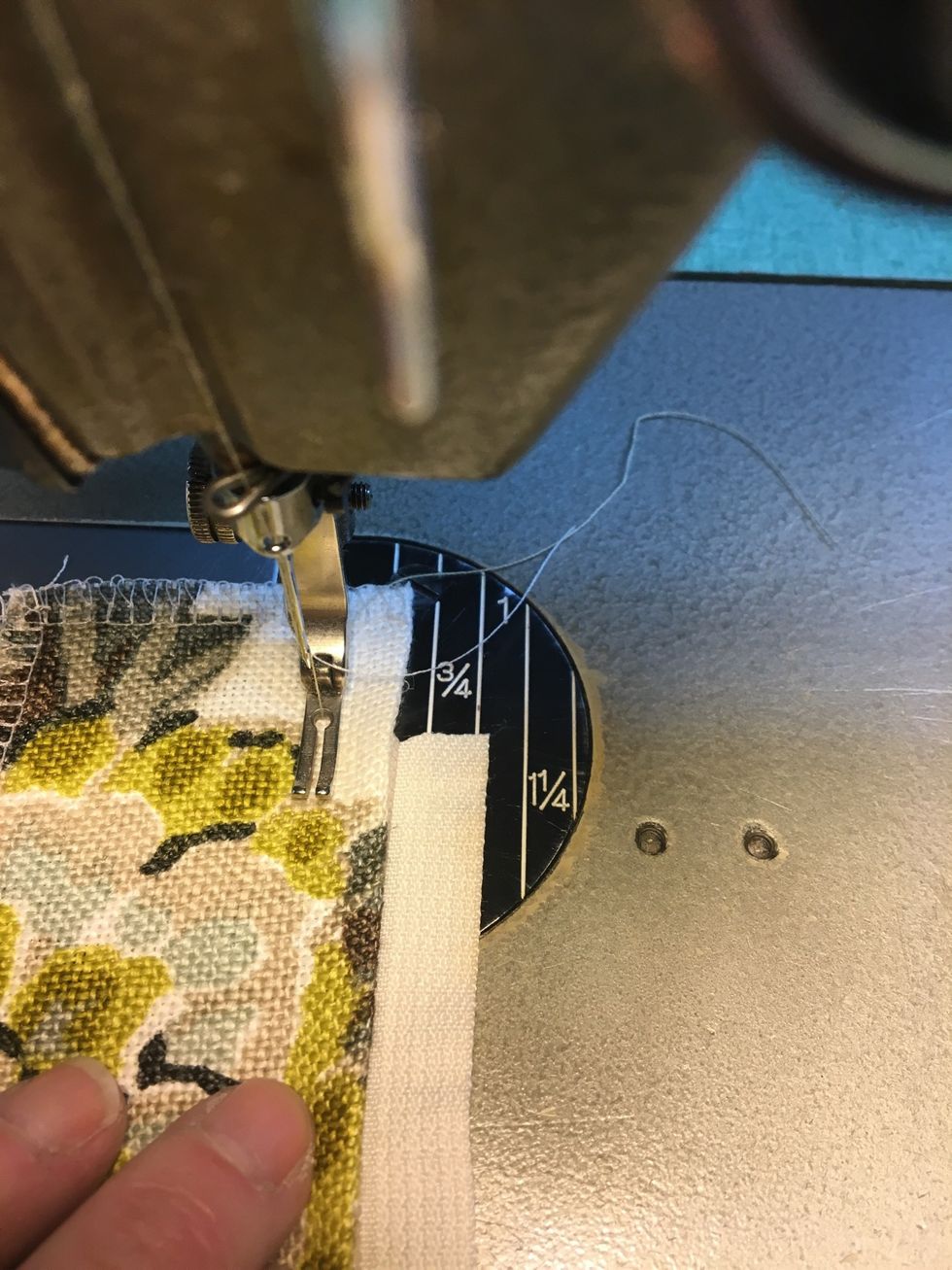 For Zipper Version: (Hook&Loop Version to follow) - Stitch ZIPPER FLANGE onto the front of the zipper - about an inch from the edge - overlapping the teeth with folded edge as shown.   (Right side up)
