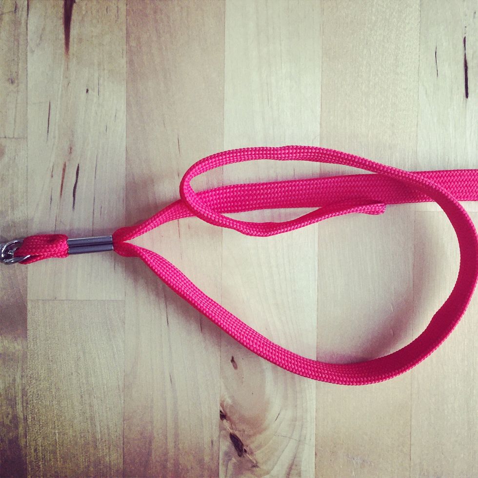 Form a C loop over the bottom strap.