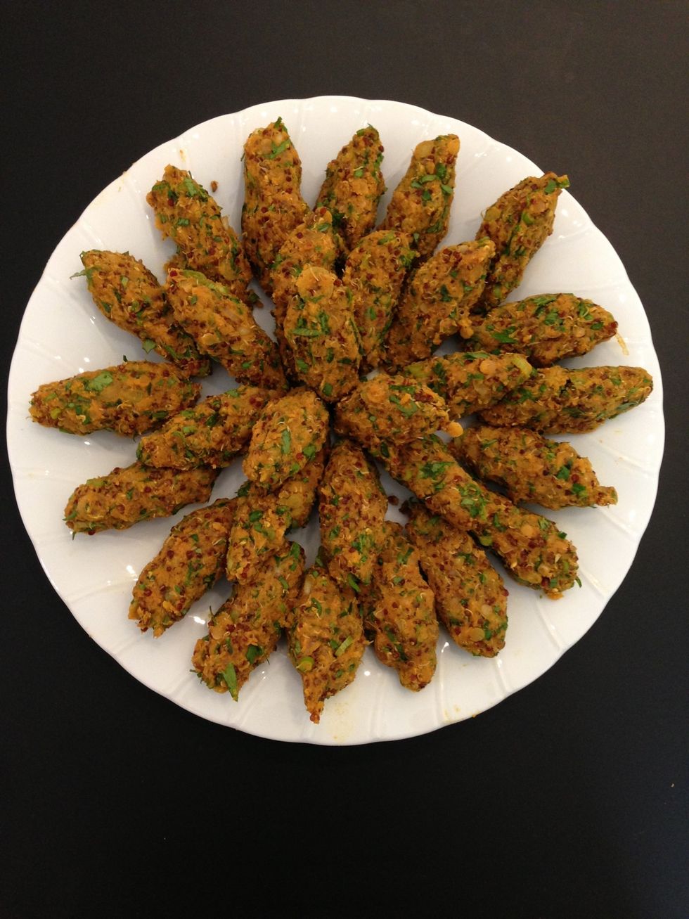 Form by hands. They will make around 30 pieces. It is a squeeze between the palm and the fingers...a child's play so easy and fast.. Brush them with olive oil. They tend to form a dry crust