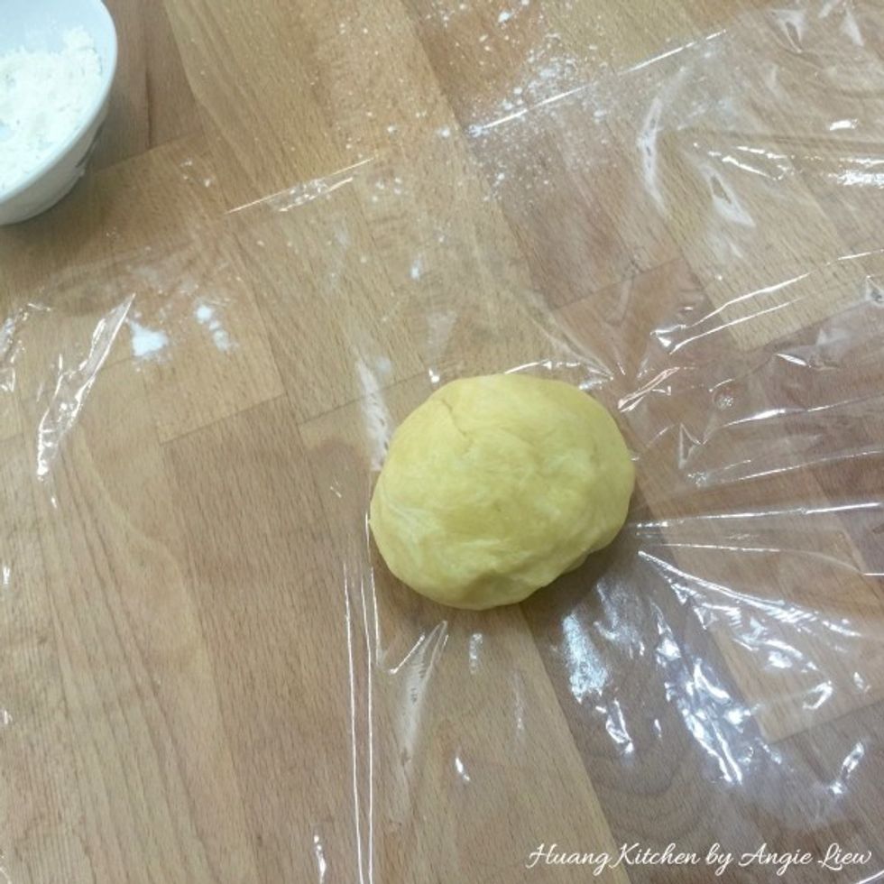 Form each half into a round dough.